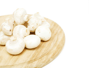 champignons on wooden board