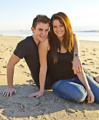Fototapeta premium Happy Teenage Couple on the Beach