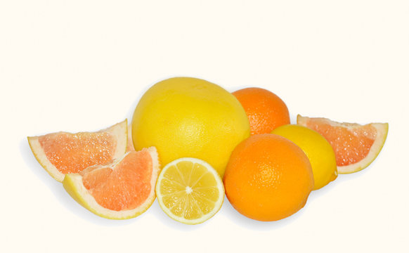 Orange fruit, yellow grapefruit and lemon