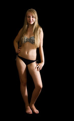 Fototapeta na wymiar woman wearing bikini on black