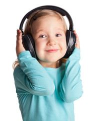 Little girl in headphones