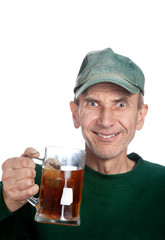 man holding mug with tea