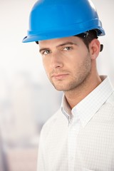 Portrait of goodlooking young man in helmet