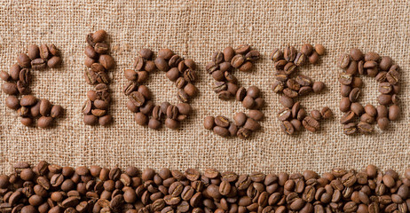 The word Closed from coffee beans on linea material