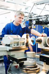 worker at machine tool operating