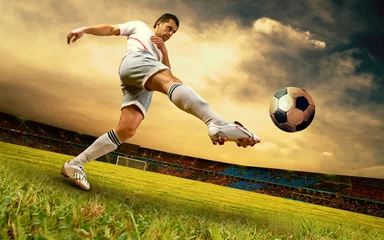 Acrylic prints Football Happiness football player on field of olimpic stadium on sunrise