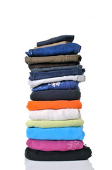pile of folded clothes on white background - 31009907