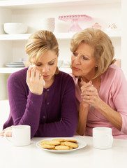 Mother Consoling Grown Up Daughter