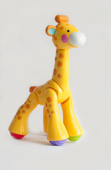 Childs giraffe toy isolated on white background