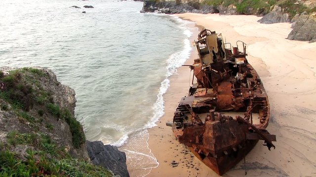 Fishing boat stranded in a portuguese beach
