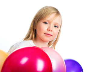 Fototapeta na wymiar Pretty little girl with balloons