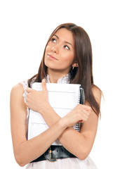 Fototapeta premium Woman thinking and holding in hand pen with notepad