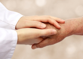 Nurse helping senior