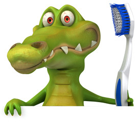 Crocodile et brosse à dents