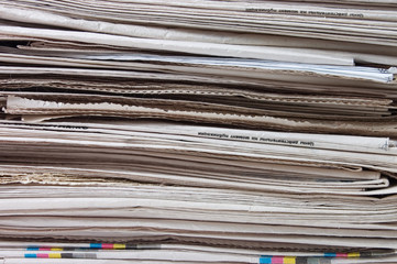 Pile of newspapers close up