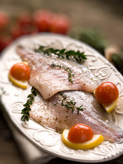 fish fillet with herbs ready to cooking