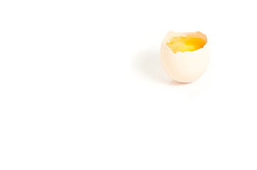 broken egg on white background
