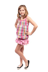 Little girl standing, isolated on white