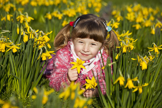 girl and daffodils