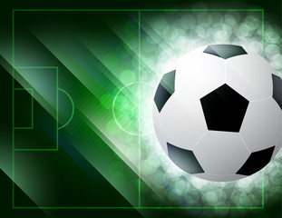 Obraz premium soccer ball on the green field with grass. vector illustration