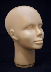 A human face wig holder