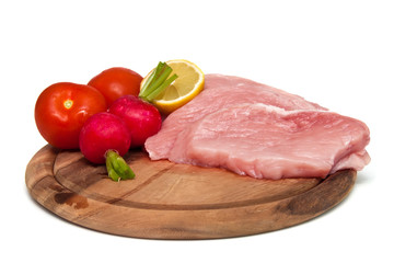 Fresh, raw meat on a cutting board