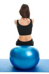 Fitness women exercising on fitness ball