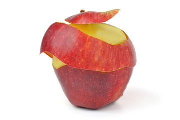 czerwone jabłko częściowo obrane na białym tle - obrazy, fototapety, plakaty
