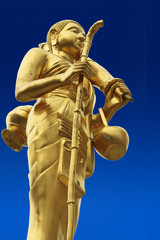 Obraz premium Buddha statue on a blue background