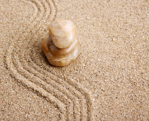 Fototapeta na wymiar Zen stone in the sand
