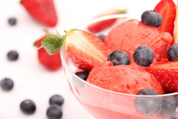 Strawberry ice cream in bowl, isolated on white background