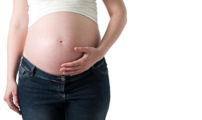 pregnant woman holding her belly