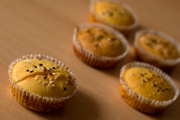 Homemade salty muffins on table top