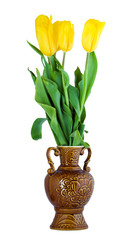 Yellow tulips flowers in vase