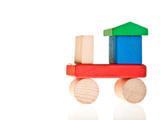 Wooden toy colorful blocks isolated on white