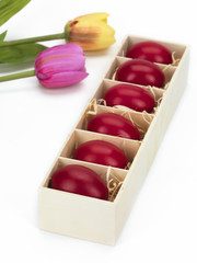 red eggs and tulips