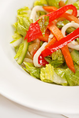 Vegetable salad with calamari