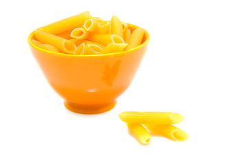 One yellow bowle with pasta over white background