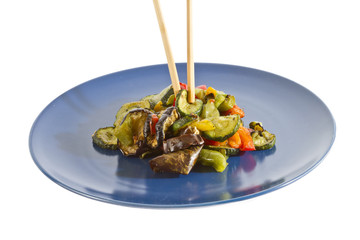 chopsticks and mixed grilled vegetables