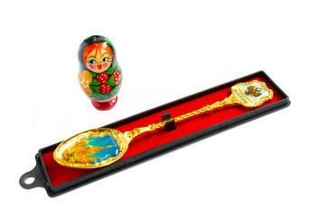 The souvenir spoon and matreshka is traditional russian gifts