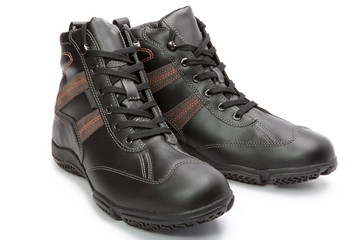 Men's boots on white background..