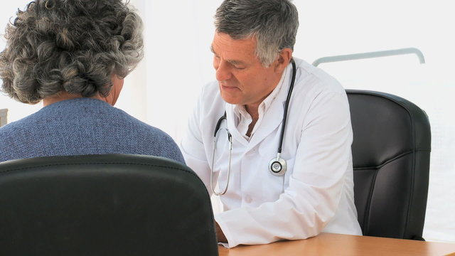 Doctor talking with his patient