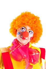 Obraz na płótnie Canvas A girl dressed as a clown is looking up