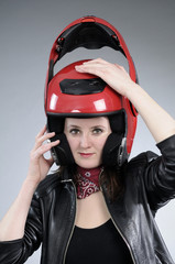motorcyclist girl arranging visor
