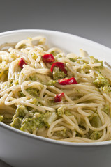 Italian dish of spaghetti with broccoli and hot pepper