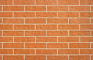 Brick wall with undulating blocks