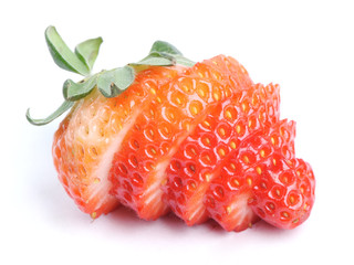 Cut strawberry isolated on white