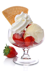 Ice cream with strawberries and whipped cream