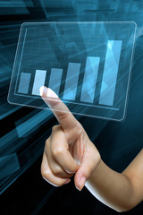a woman hand make a graph on a digital screen