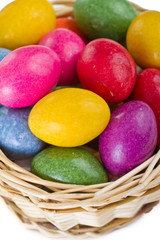 colorful easter eggs in basket
